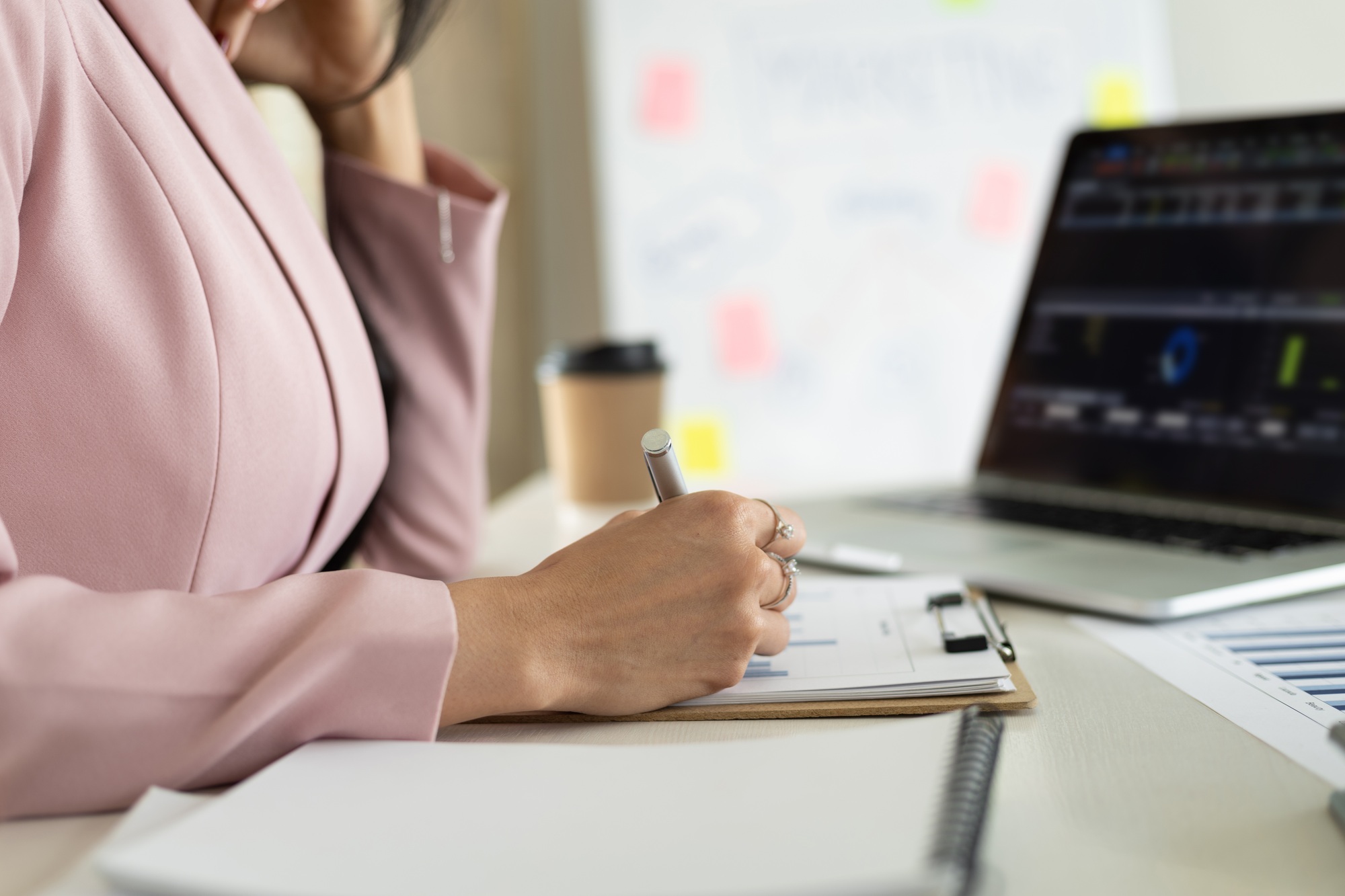 Financial advisors work with laptops and business risk analysis and financial planning for investmen
