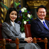 South Korea's President Yoon Suk Yeol sits with his wife Kim Keon Hee, after he addressed MPs in the Royal Gallery during a visit to the Palace of Westminster on Nov. 21, 2023 in London, England.
