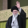 In this photo released by an official website of the office of the Iranian supreme leader, Supreme Leader Ayatollah Ali Khamenei waves to the crowd during a meeting with school and university students, in Tehran on Saturday.