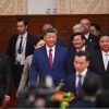 China's President Xi Jinping, center, North Korea's leader Kim Jong Un, right, and Russia's President Vladimir Putin, left, arrive at a reception in the Great Hall of the People, following a military parade marking the 80th anniversary of victory over Japan and the end of World War II, in Beijing on Sept. 3, 2025.