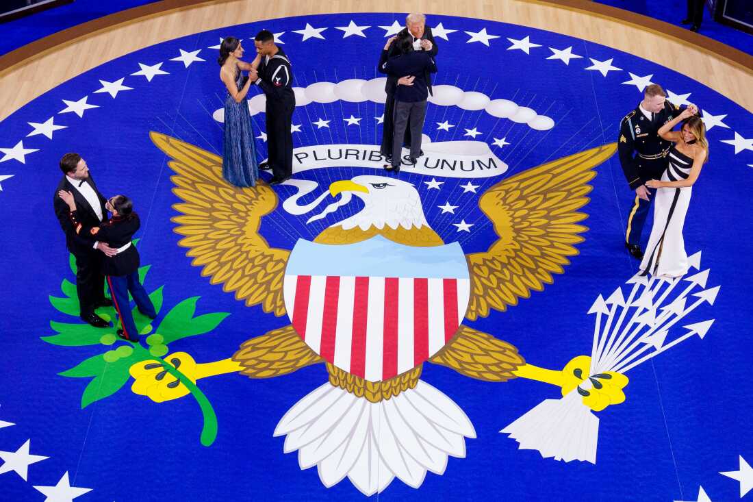 President Donald Trump, first lady Melania Trump, Vice President JD Vance, and second lady Usha Vance dance with service members during the Commander-in-Chief Ball on Monday.