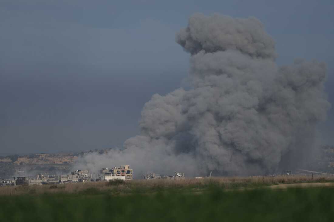 Smoke rises after an explosion in northern Gaza, before a ceasefire deal between Israel and Hamas goes into effect, as seen from Israel, January 19, 2025.