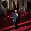 President Donald Trump talks to the media in the Hall of Nations during a tour at the John F. Kennedy Center for the Performing Arts after leading a board meeting on March 17, 2025.
