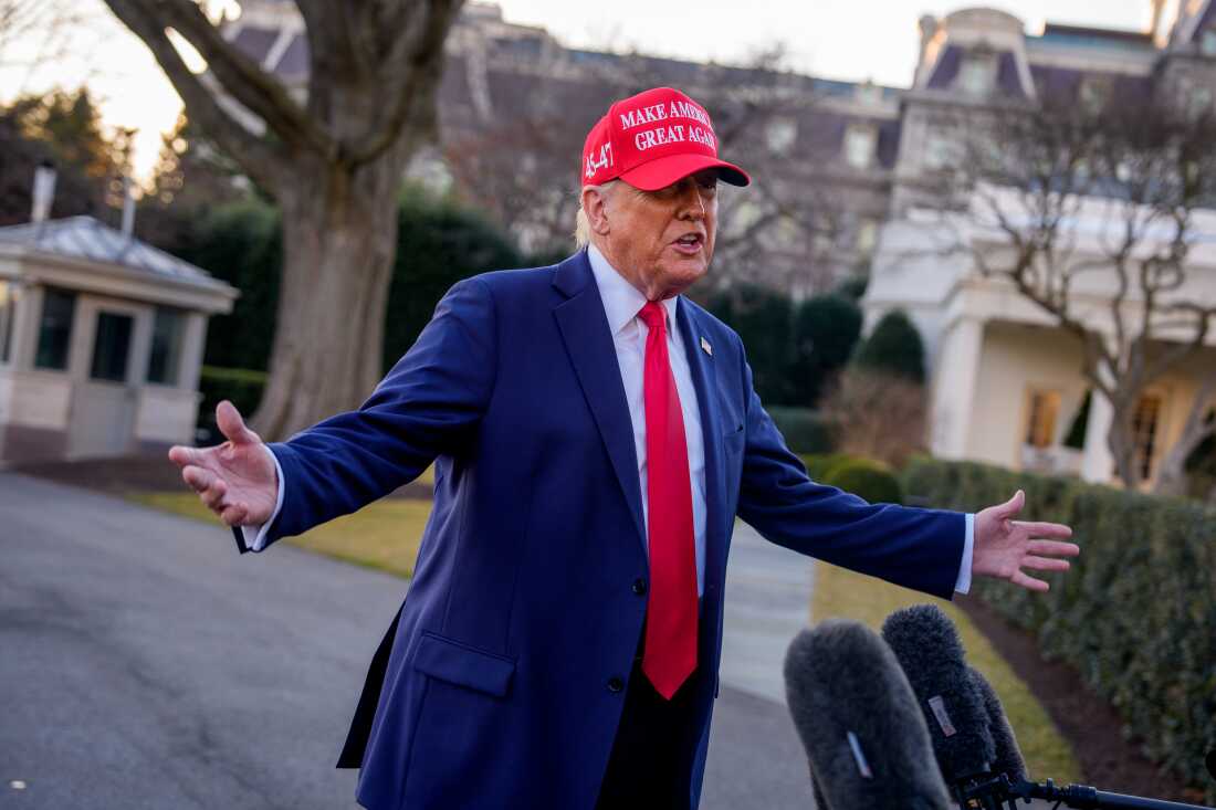 President Trump speaks to members of the media before boarding Marine One on the South Lawn of the White House on Feb. 28.