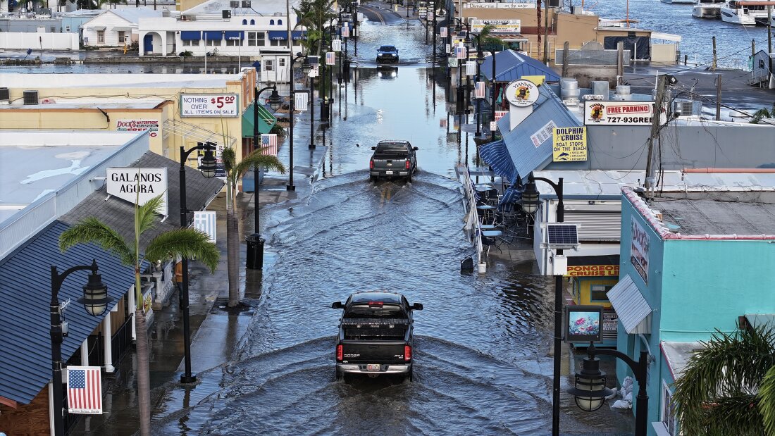 Flood waters cover the main streets of Tarpon Springs, Fla. after Hurricane Helene passed offshore on Sept. 27, 2024.