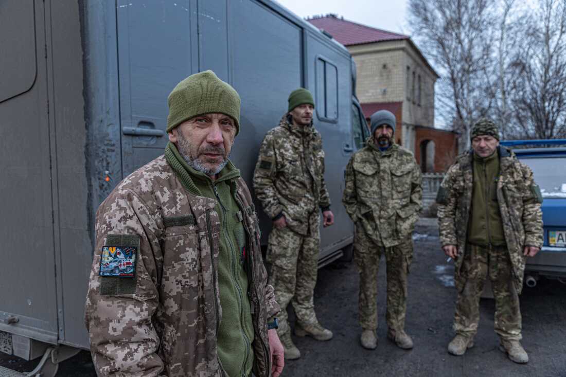 Serhii, 58, (left) driver-paramedic, commender of medical evacuation unit "Shark" of 117th Separate Heavy Mechanized Brigade born in Kropyvnytskyi and other members of the unit at Dnipropetrovsk and Donetsk regions border.