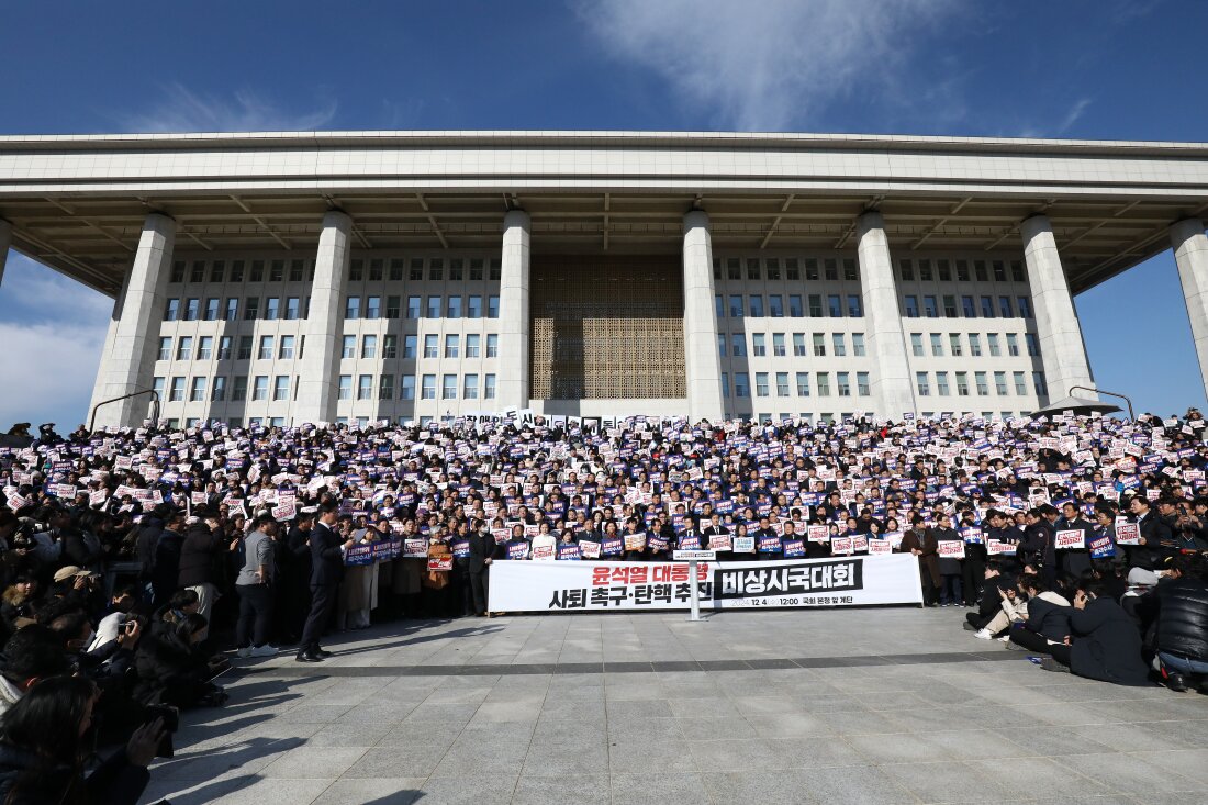 Lawmakers and members of the South Korea's main opposition Democratic Party (DP) demonstrate against the country's president at the National Assembly on Wednesday in Seoul, South Korea.