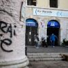 People walk past the faculty of economy of the Aix-Marseille University in Marseille on Oct. 4, 2023.
