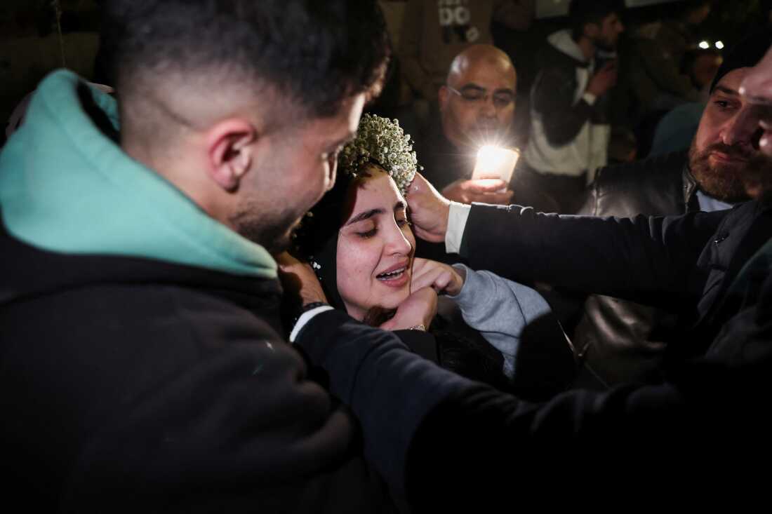 A freed Palestinian prisoner is greeted after their release from an Israeli jail as part of a hostages-prisoners swap and a ceasefire deal in Gaza between Hamas and Israel, in Ramallah, in the Israeli-occupied West Bank Jan. 20, 2025.