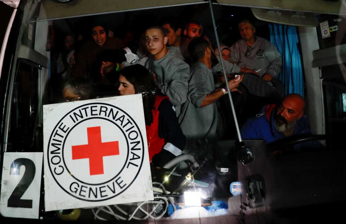 Freed Palestinian prisoners ride in a bus after their release from an Israeli jail as part of a hostages-prisoners swap and a ceasefire deal in Gaza between Hamas and Israel, outside the Israeli military prison, Ofer, near Ramallah, in the Israeli-occupied West Bank, January 20, 2025. 