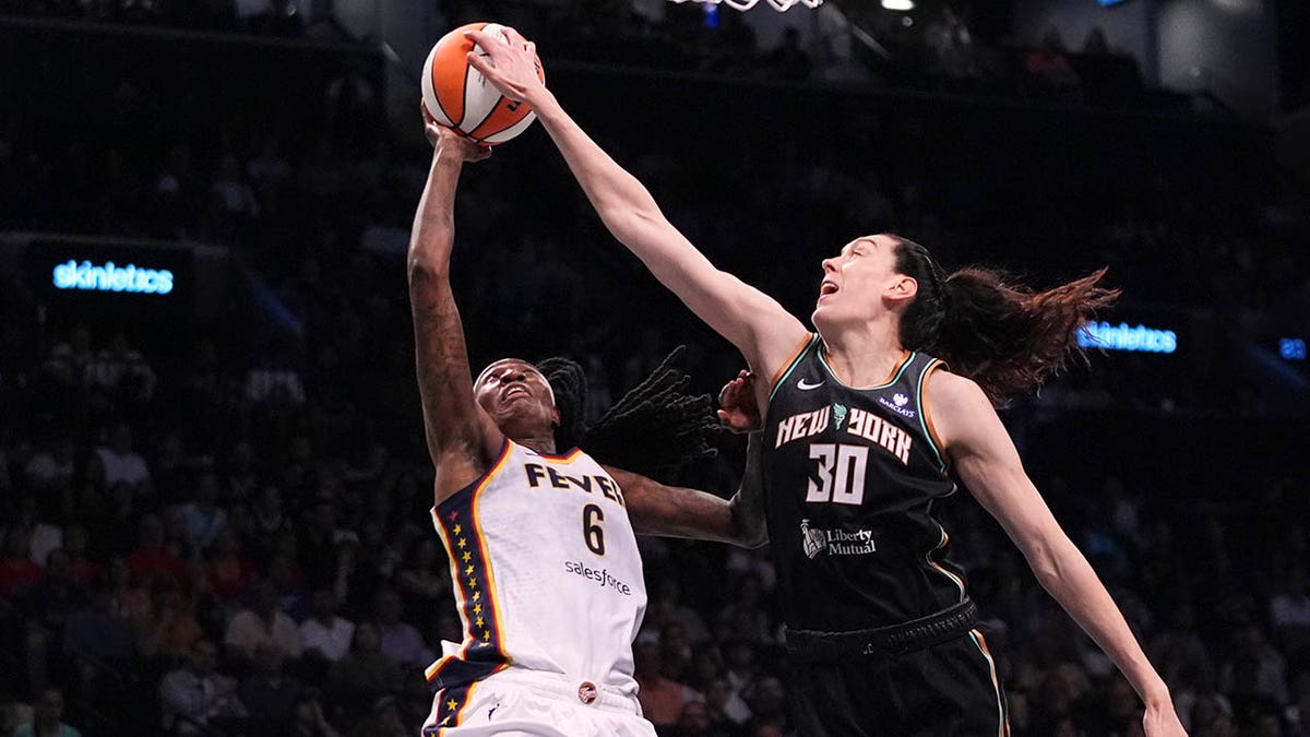 Breanna Stewart blocks shot