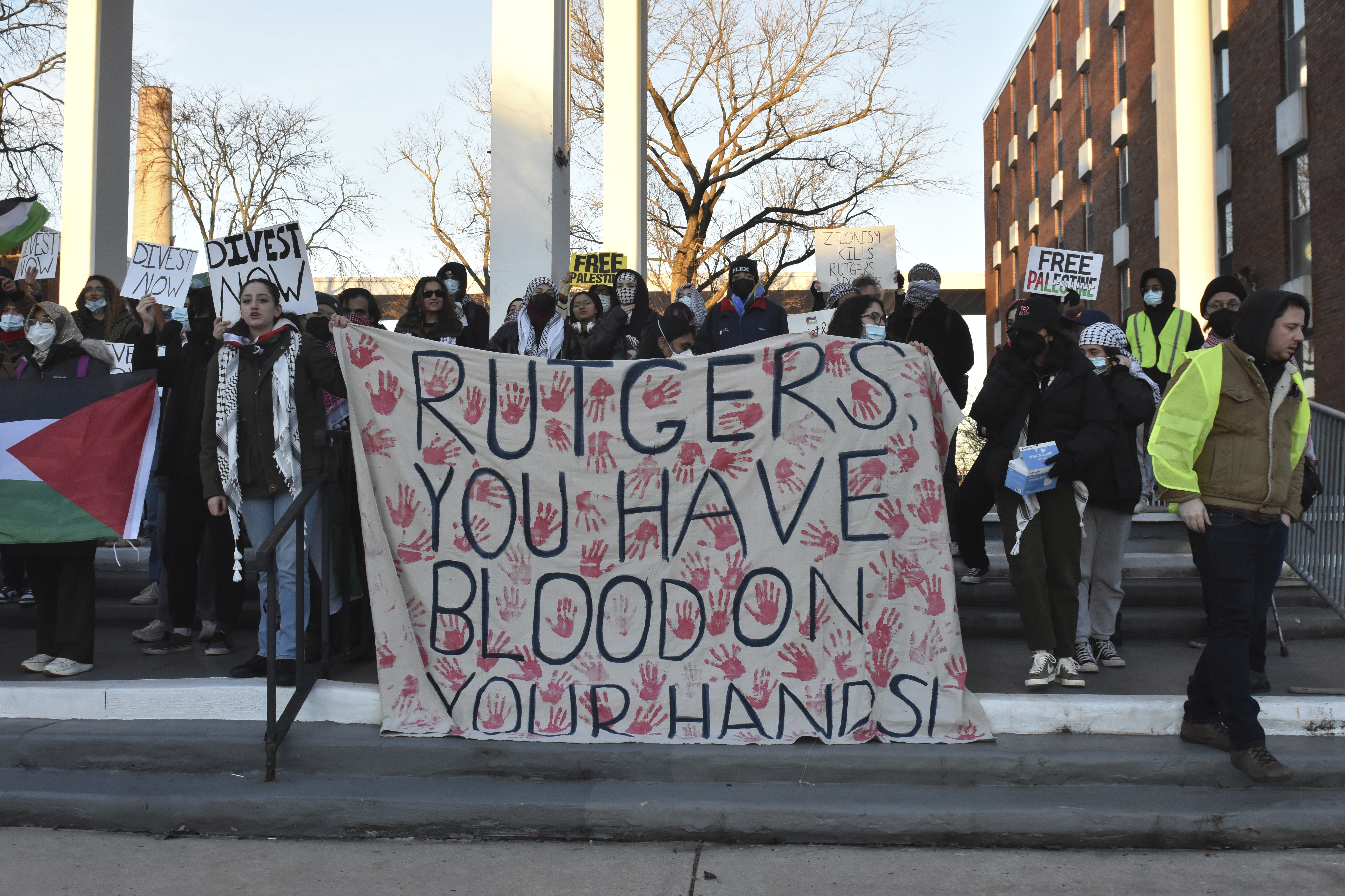 Students are protesting to reinstate the ''Students For Justice In Palestine'' group at Rutgers University in New Brunswick, New Jersey, United States, on December 14, 2023. The group was suspended by the Rutgers University-New Brunswick administration, and the protesters are demanding that the administration unsuspend the group. (Photo by Kyle Mazza/NurPhoto via AP)