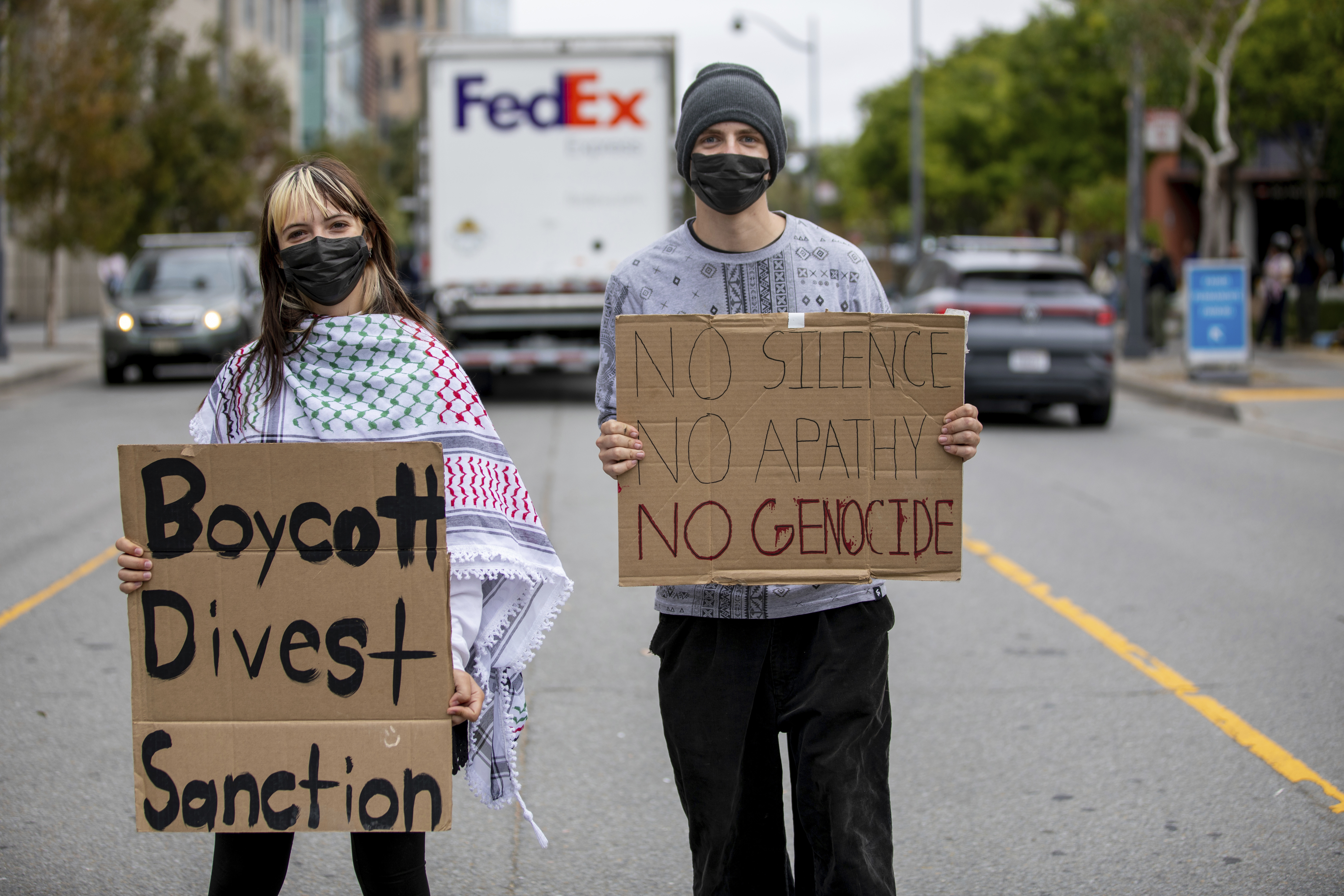 Student protest calling on the UC system to divest from its investments in Israeli companies while gathering outside of UC San Francisco's Rutter Center, where a meeting of the UC Board of Regents was held at the University of California, San Francisco, Wednesday, July 17, 2024. (Thomas Sawano/San Francisco Chronicle via AP)